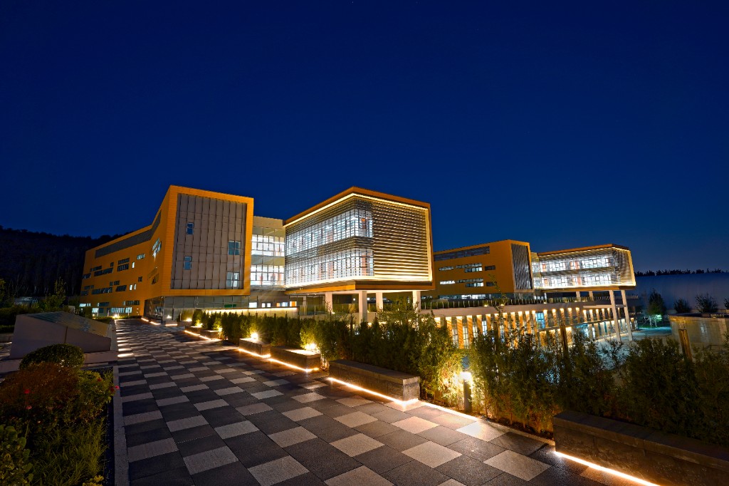 Evening view of a Beijing international campus hosting the summer academy program for students